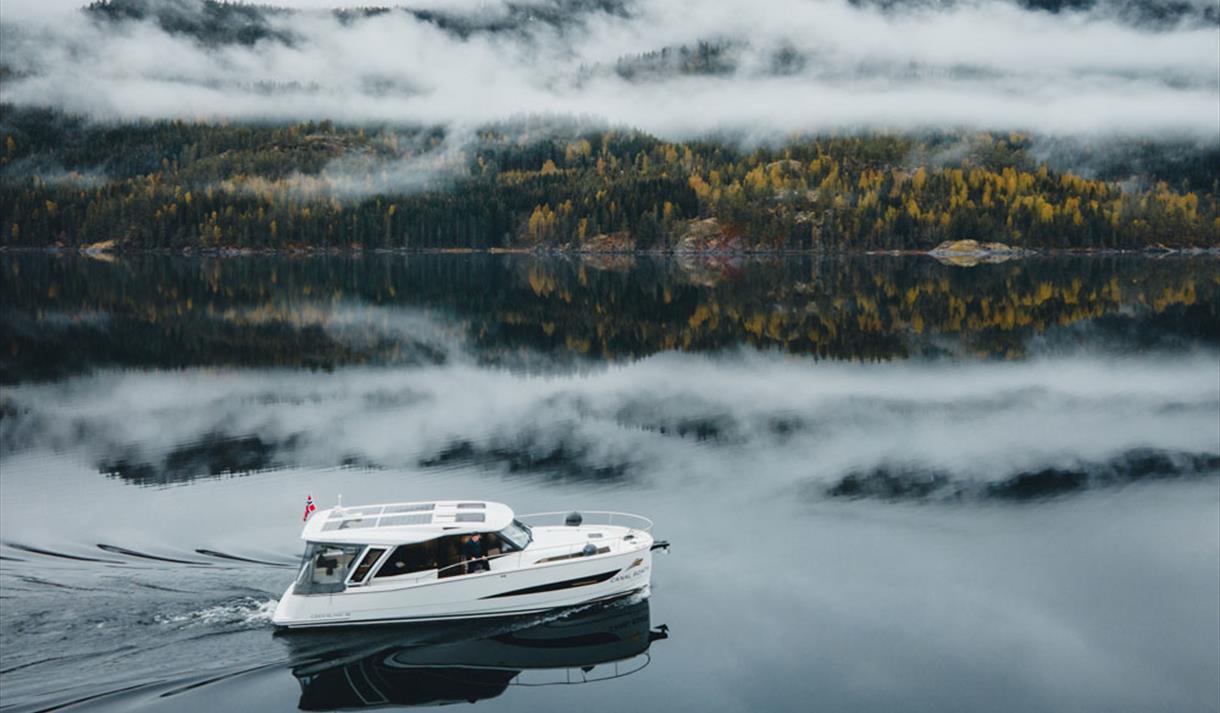 electric boat from Canal Boats Telemark on the way up the Telemark Canal