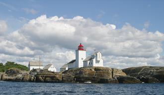 langøytangen lighthouse seen from the water