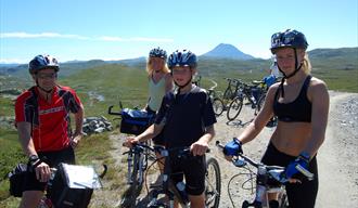 To cyckle Kraftvegen brings you into beautiful high mountain landscape at Hardangervidda