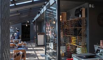 the restaurant with wine cabinet at Strøm mat & bar in Skien