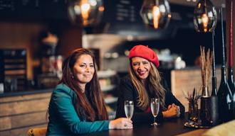 two girls at Ælvespeilet Mat & Vinbar in Porsgrunn