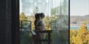 Girls in the sauna enjoy the nice view