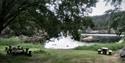 There are benches and picnic tables,