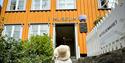 Girl outside the Kittelsen House in Kragerø.