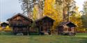 the storehouses at Kviteseid village farm in autumn
