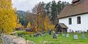 the old stone church in Kviteseid with cemetery
