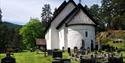 the old stone church in Kviteseid with cemetery