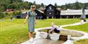 mother and daughter play in the water park at the Norwegian skiing museum