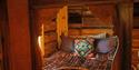 bed in a cabin at Bolkesjø Gård