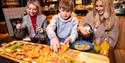 guests eating pizza at Øya Spiseri