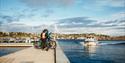 cyclists waiting for the taxi boat
