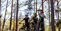 man and 2 boys look over the cycle path at Kragerø Resort