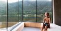 boy sitting inside the Soria Moria sauna