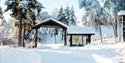 The driveway to Groven Camping & Hyttegrend in winter