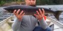 man holding a fish