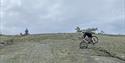 cycling over boulders on Gautefall