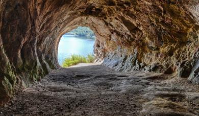 Mikaels cave in Skien with an opening towards the water