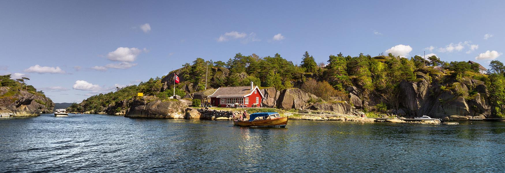 leisure boat sailing in the archipelago off the coast of Bamble