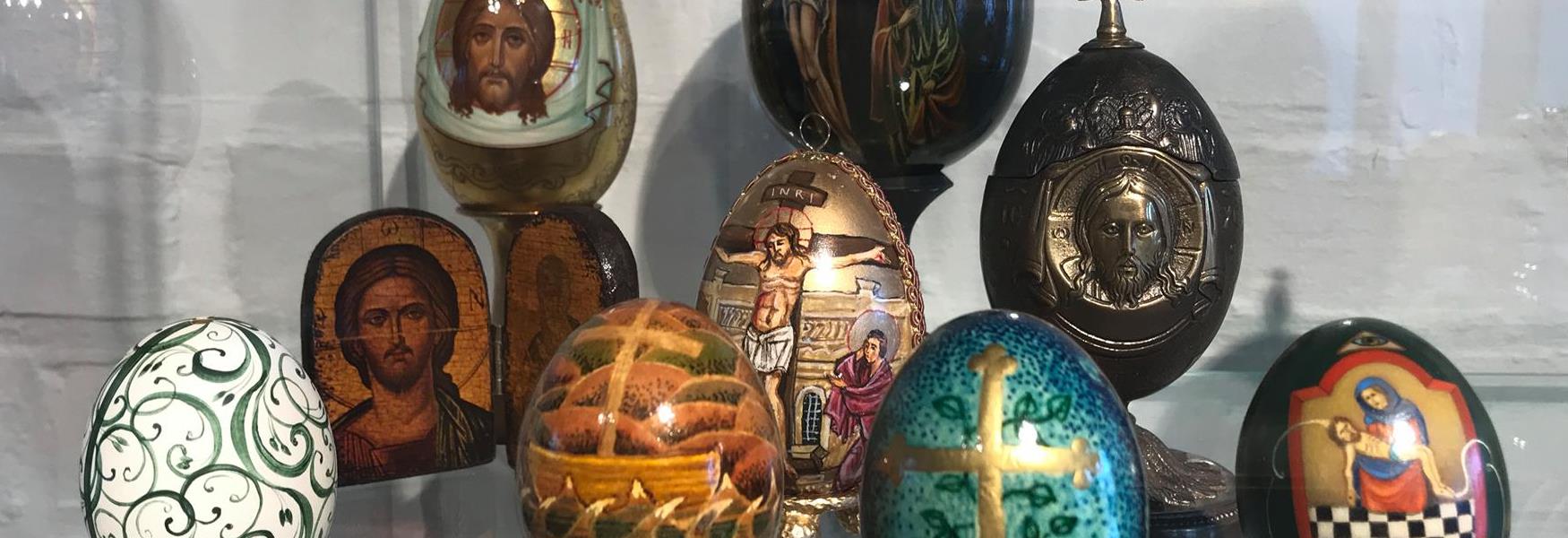 collection of painted eggs with pictures