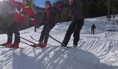 Happy girls on skis