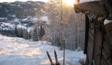 From the Winter, Sondre's cabin with original skis outside
