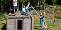children build a playhouse at Groven Camping