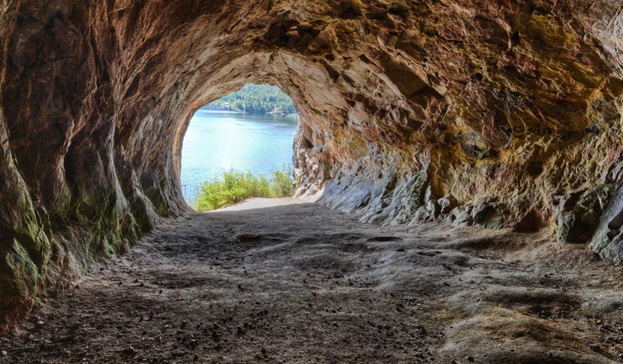 Mikaels cave in Skien with an opening towards the water