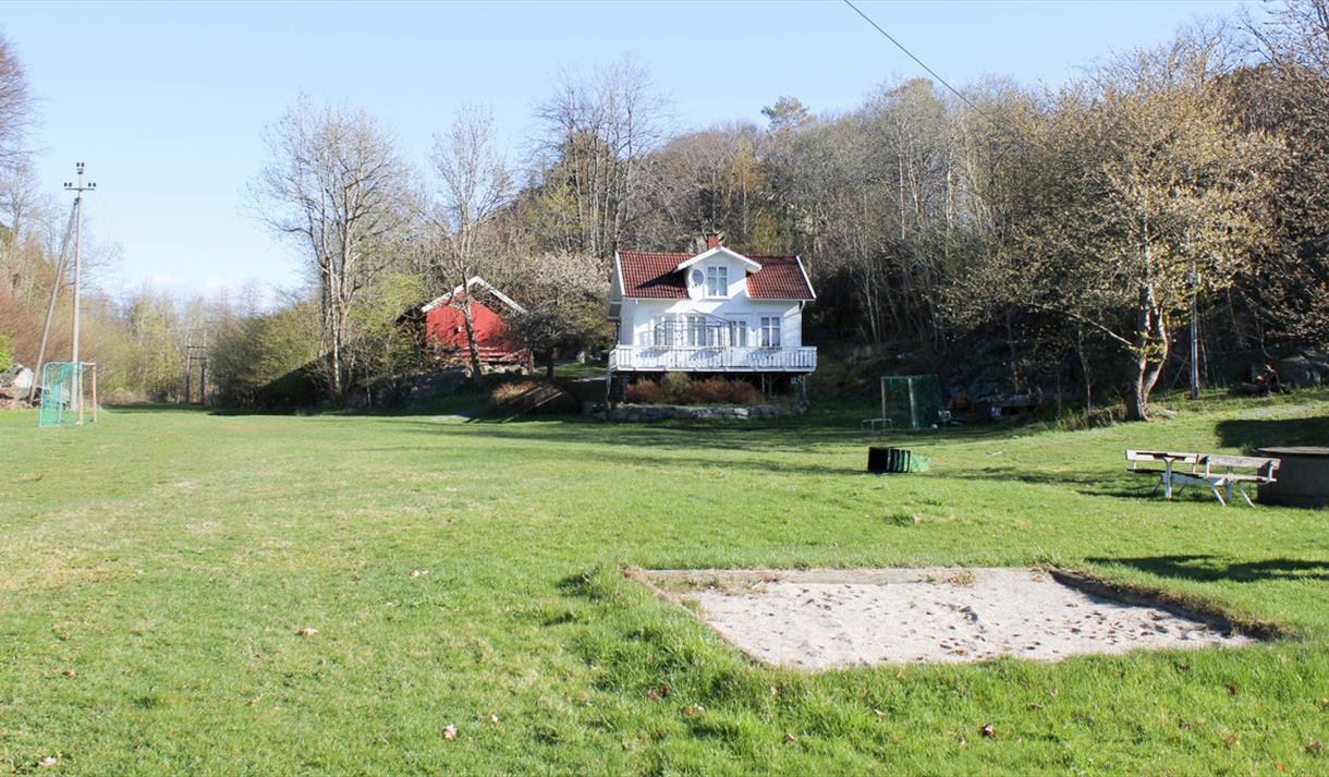 house, grass and playground on Stokkøya